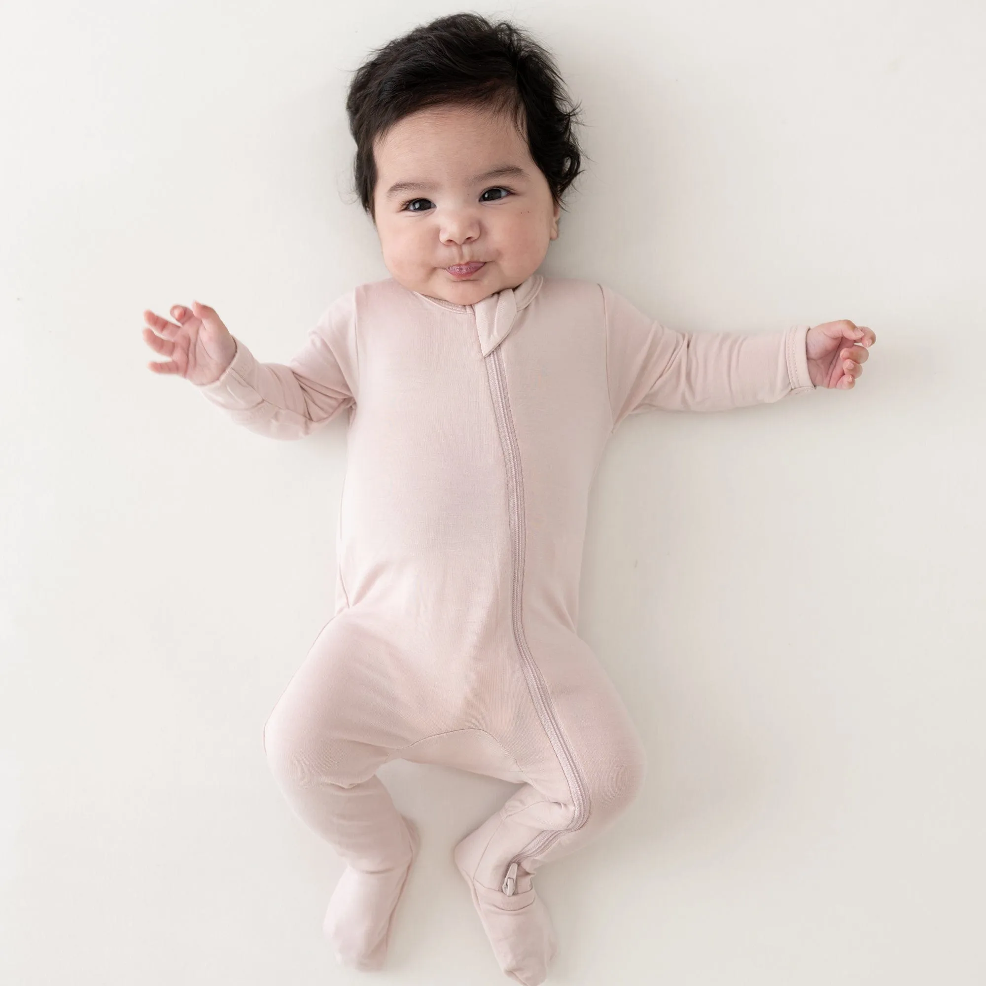 Kyte Baby Zippered Footie | Blush