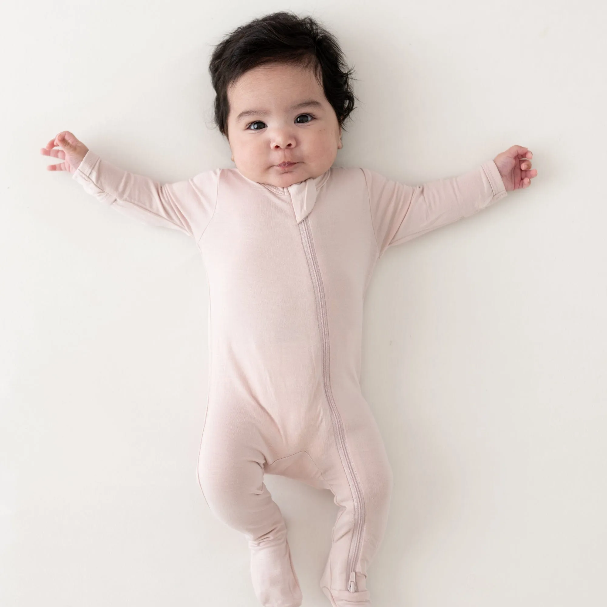 Kyte Baby Zippered Footie | Blush